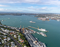 An aerial view of Devonport Naval Base on a nice day with a few clouds