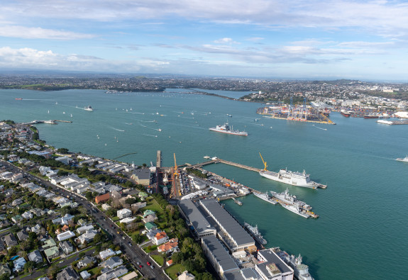 An aerial view of Devonport Naval Base on a nice day with a few clouds