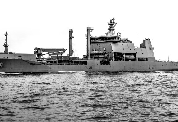 Royal New Zealand Navy's HMNZS Aotearoa sailing. Image in black and white. 