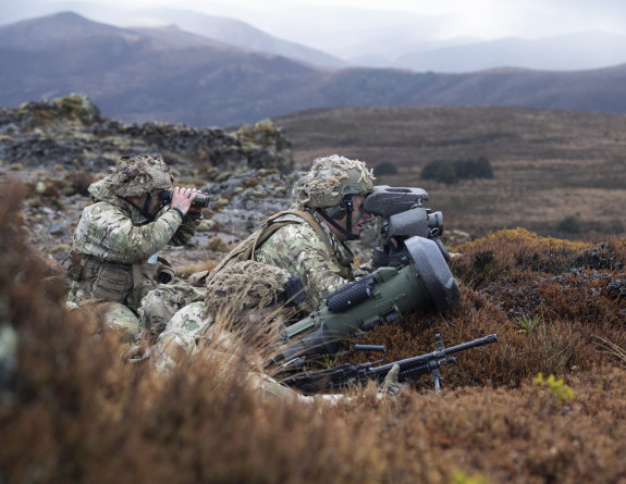 New Zealand Army shooters and spotters in a fire support group keep an eye out