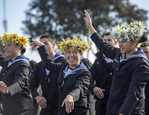 A Royal New Zealand Navy recruit performs a pacific islands dance at Graduation 