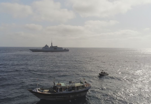 CTF150 Languedoc patrolling at sea - Languedoc ship is in the distance while two smaller boats are in the foreground.