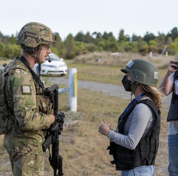 Soldiers engage with community members (role players) during Exercise Foxhound 2