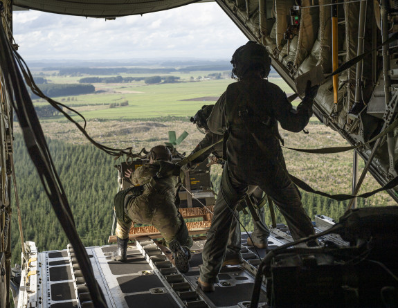 Sending the loads to the drop zone from the back of the Hercules aircraft over Manawatu.