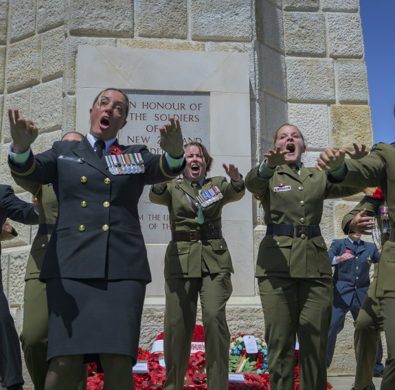 The New Zealand Memorial Service at Chunuk Bair, Gallipoli. NZDF personnel perform the NZDF haka - the faces show them yelling/screaming with passion as they speak the words. 