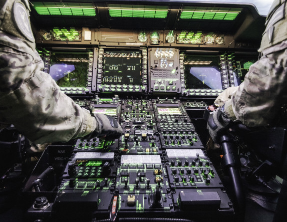 Royal New Zealand Air Force aircrew in the NH90 simulator - you can see two sets of hands working, no faces. 