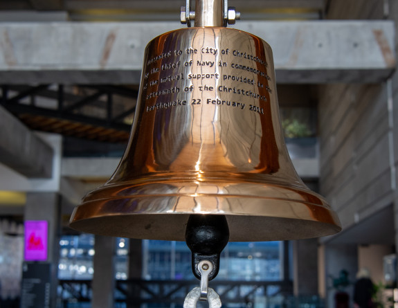 The replica bell is suspended from a wooden frame and stands proudly in the council building.