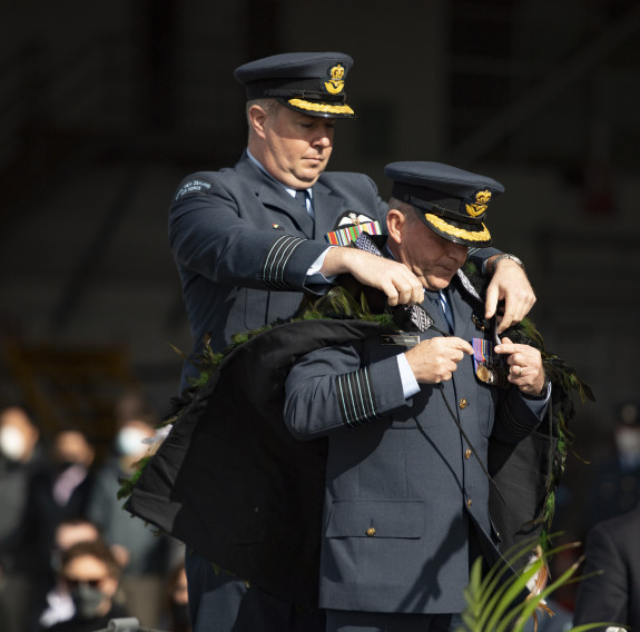 Group Captain Andy Scott, left, hands command to incoming Base Commander Group Captain Mike Cannon
