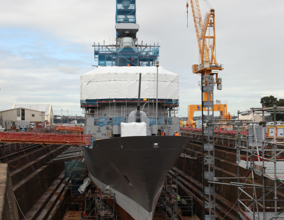 HMNZS Te Kaha in the Calliope drydock at Devonport Naval Base.