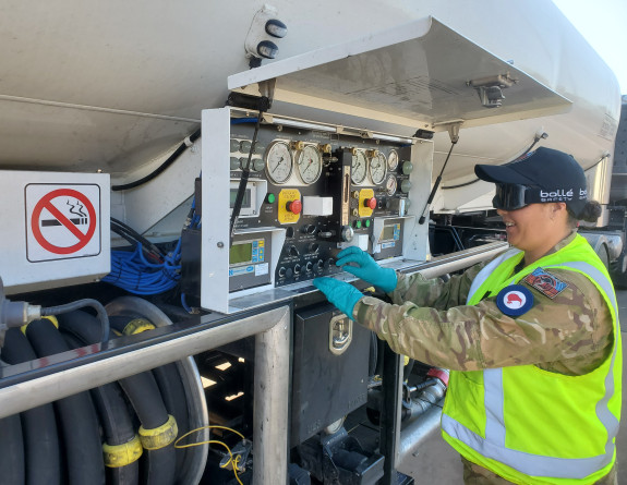 LAC James configuring the panel to commence refuelling