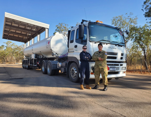 LAC James and LACW Emma Nearmy in front of the mobile refuelling vehicle