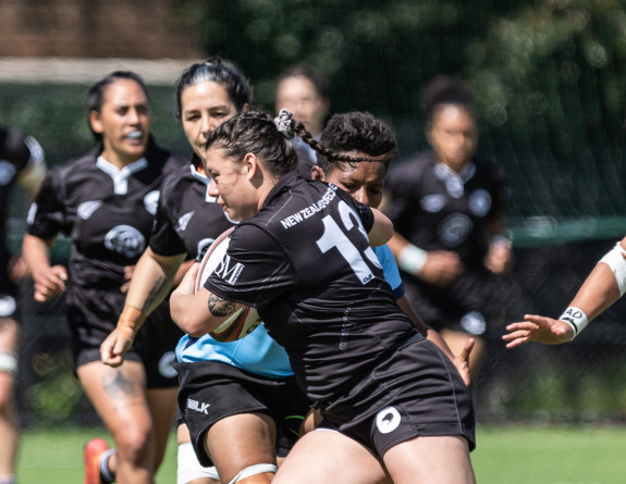 New Zealand fends off the defence of Vanuatu and Papua New Guinea in their round two match in Auckland.