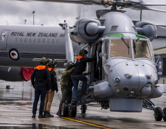 The Prime Minister was taken up on one of our Seasprite helicopters to survey the damage from the air.