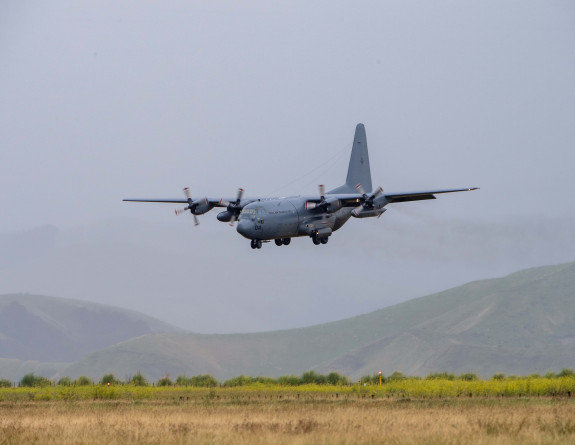 RNZAF Hercules aircraft at Napier airport loading supplies and generators for Gisborne.