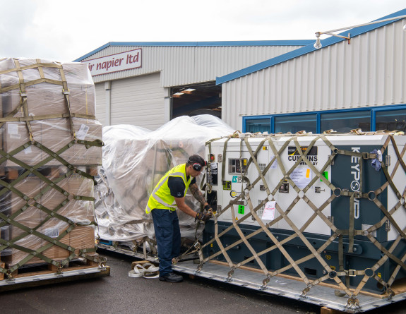 RNZAF Hercules aircraft at Napier airport loading supplies and generators for Gisborne.