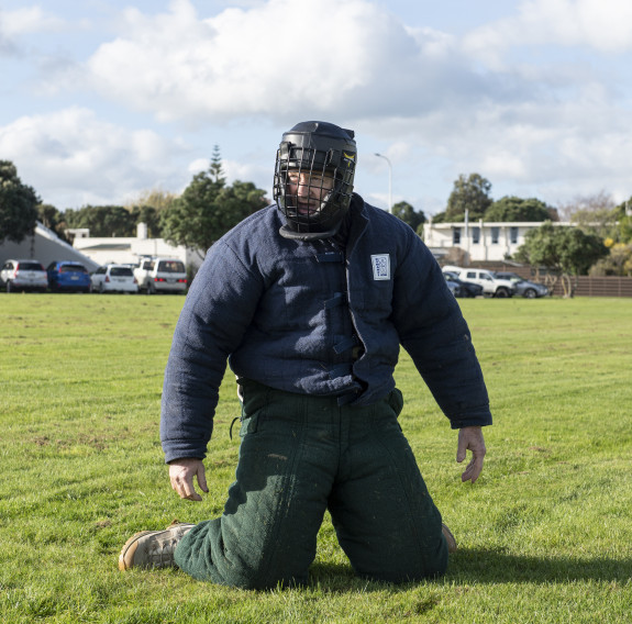 After the chase and being bitten, Group Captain Rob Shearer is on his knees in all the protective gear as he reflects on the power of the MWD capability.