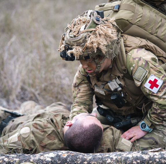 A NZ Army medic treats a detainee during Exercise Talisman Sabre.