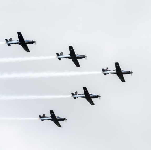 Squadron Leader Hamish Reichardt flying with the RNZAF Black Falcons (far right aircraft).