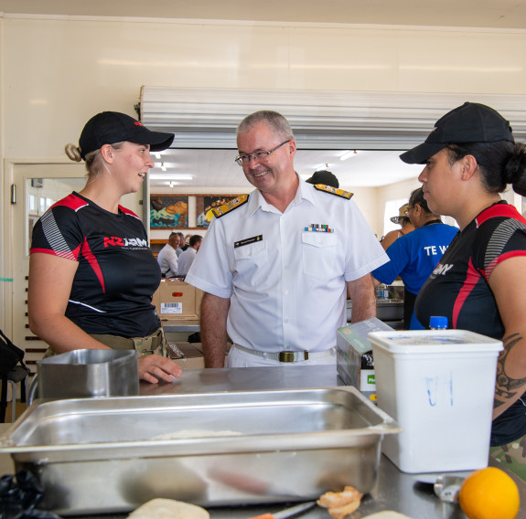 LCPL Storm Van Zyl and PTE Erina Himona chat with RADM David Proctor, Chief of Navy.