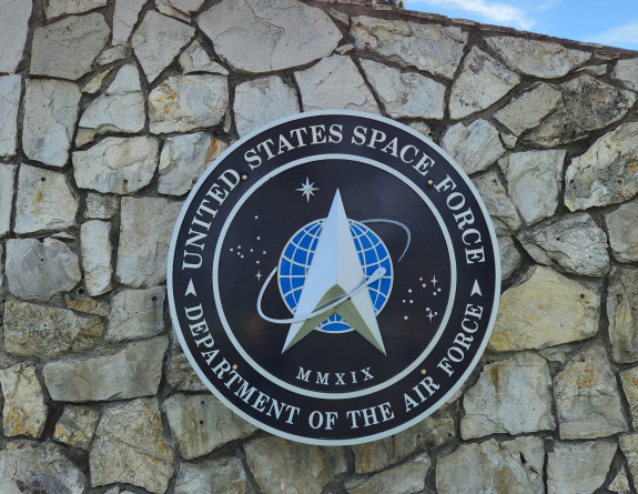 Stoned wall with the United States Space Force - Department of the Air Force sign.