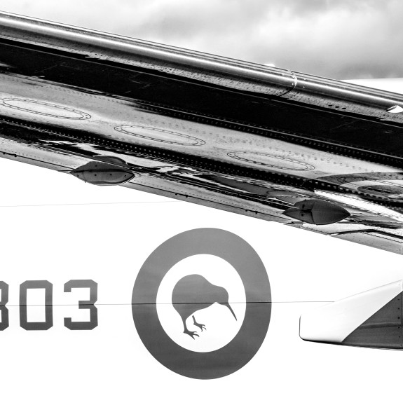 Royal New Zealand Air Force Kiwi roundel and NZ4803 text written on the side of a Royal New Zealand Air Force P-8A Poseidon aircraft. 