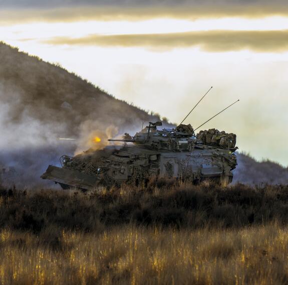 A New Zealand Army Light Armoured Vehicle fires its 25mm cannon during the final defensive battle of Exercise Crete  