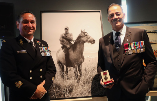 Royal New Zealand Navy Warrant Officer Lance Graham with former New Zealand Army Special Air Service soldier and Victoria Cross recipient Willie Apiata