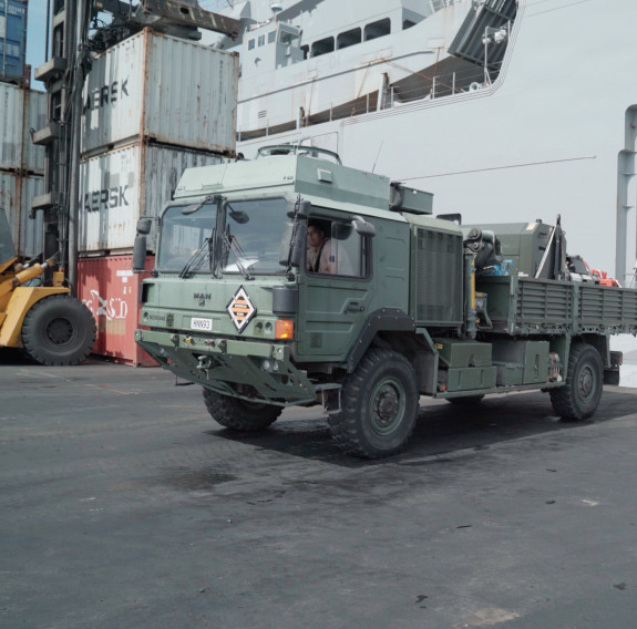 NZ Army HX-60 Truck driving off HMNZS Canterbury at Lautoka Port.