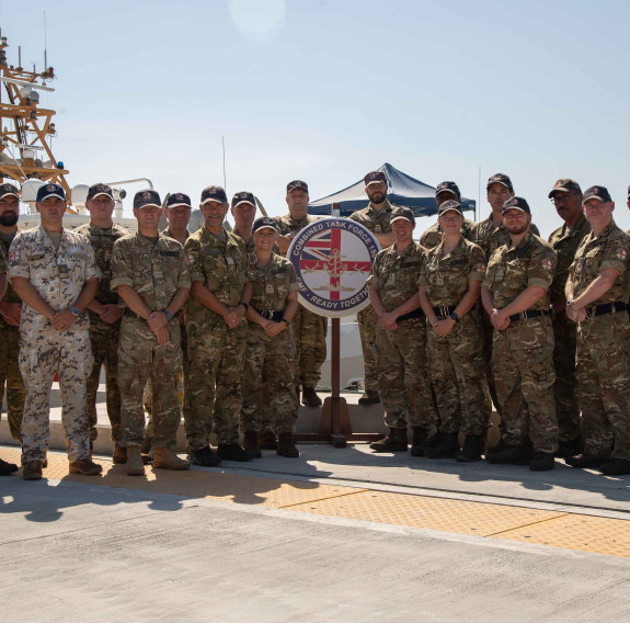 A group photo of the personnel in the Royal Navy-led CTF 150, including four RNZN personnel.