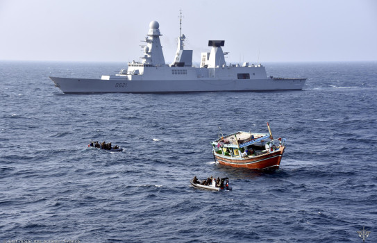 Sailors on French destroyer FS Chevalier Paul interdict a dhow in the Indian Ocean.