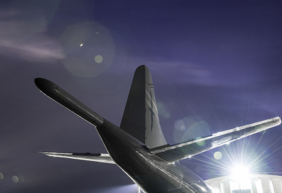 P-3K Orion in the night light, showing the tail of the aircraft. 