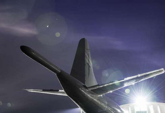 P-3K Orion in the night light, showing the tail of the aircraft.