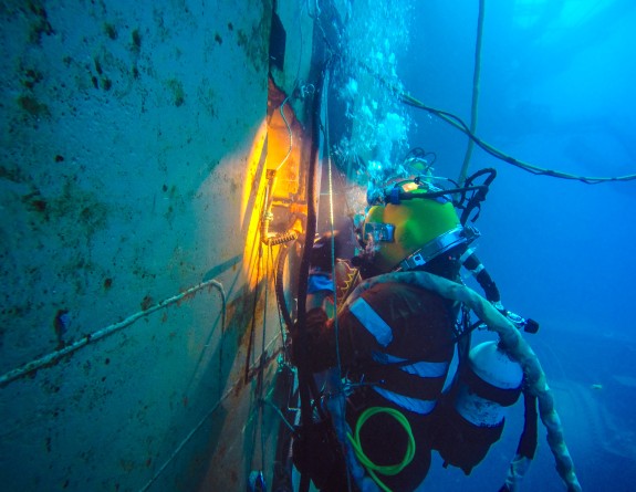 Divers cutting main deck access 7