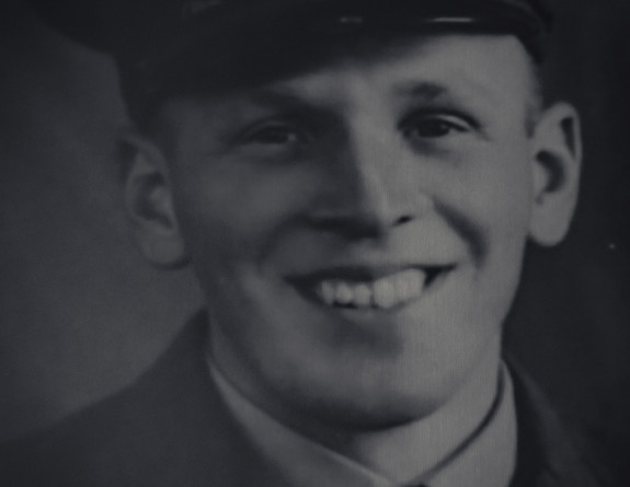 A black and white portrait of Former RNZAF technician Ron Hermann