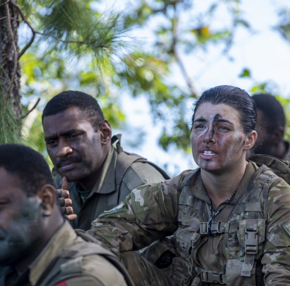  Cadet Jasmine Hill gives feedback to her peers while undertaking Exercise Veiliutaki in the Republic of Fiji