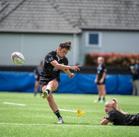New Zealand Defence Fern Leah Miles, held the ball steady while captain Hayley Hutana kicked a conversion in the semi-final game against Australia, securing a final spot against France. 
