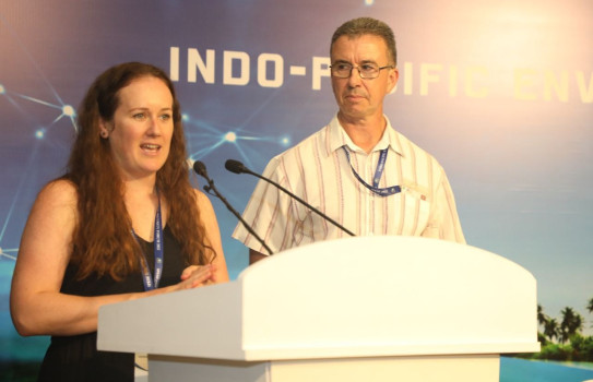 Dr Lee Bint (left) and Wing Commander Trevor Hammond (right) address the 2022 Indo-Pacific Environmental Security Forum, where they helped spark a programme to offset the carbon footprint of the 140 people travelling to attend the Maldives event.