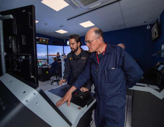 ‘Haggis’ Henderson takes control of his ship at the Royal New Zealand Navy bridge simulator