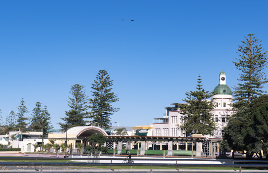 Two Texans fly across the blue skies of Napier above the iconic soundshell.