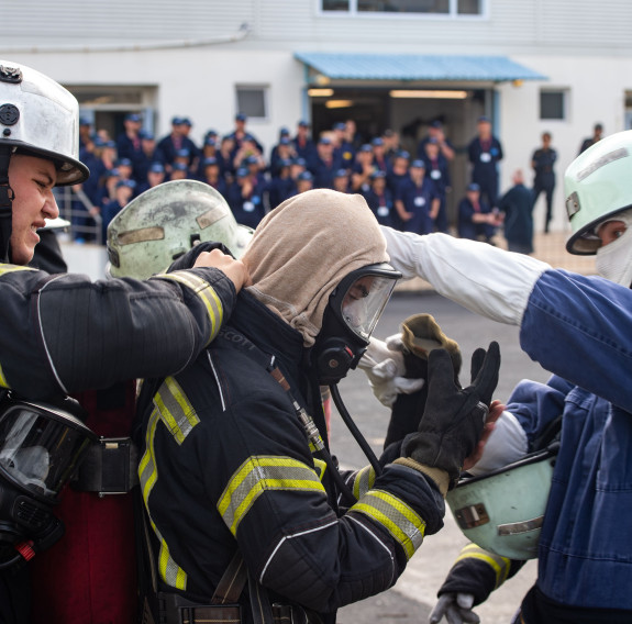 Teachers attending the School to Skies and School to Seas Teachers’ Edition Camp observing the Royal New Zealand Navy Sea Safety Training Squadron at Devonport Naval Base.