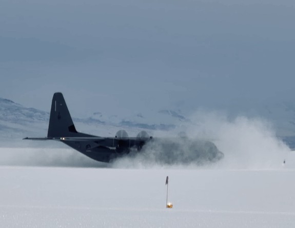 A Royal New Zealand Air Force C-130J Hercules at Phoenix Airfield, Antarctica during a medical evacuation mission. Credit: Justin Busbridge