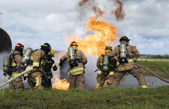 RNZAF and USAF firefighters work together during a joint live-fire training exercise during Mobility Guardian 23 at Andersen Air Force Base (Staff Sergeant Malissa Lott, USAF)   