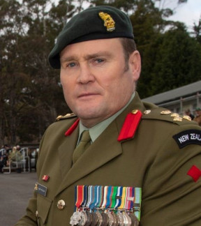 A portrait of Land Component Commander (LCC) Brigadier Hugh McAslan