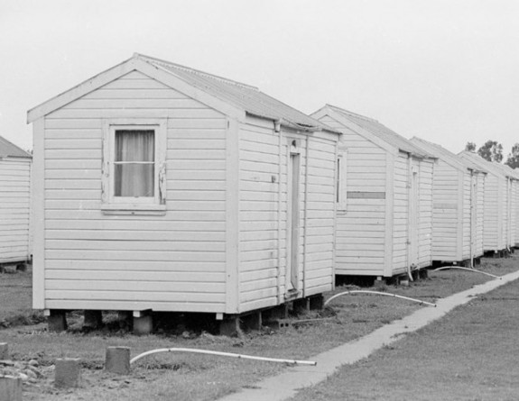 A black and white photo of WW2 hutts in Linton