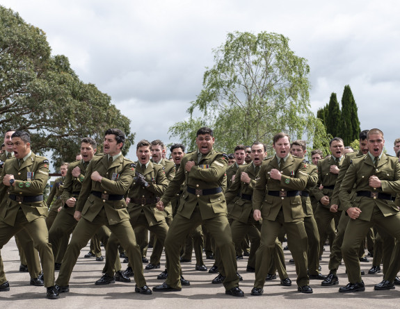 Army soldiers perform the haka as part of the unveiling of the 1st Battalion, Royal New Zealand Infantry Regiment (1RNZIR) memorial wall.