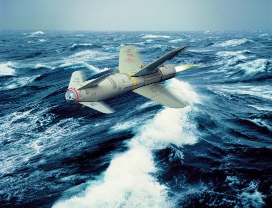 Missile flying above the water