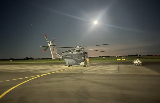 NH90 on the tarmac at Base Ohakea underneath the moon.