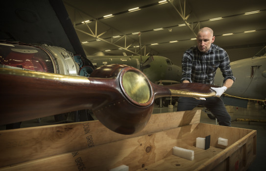 Exhibition Designer Chris Pole unpacks a Watts Propeller from a Gloster Grebe aircraft ahead of the NZPAF100: The Origins of New Zealand Air Power exhibition due to open 9 June 2023 at the Air Force Museum of New Zealand in Christchurch