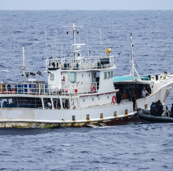 A boarding team prepares to approach a vessel of interest