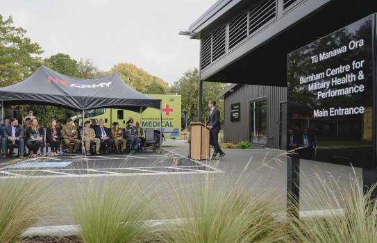 Photo 5. Mil Health & Performance Centre in Burnham   opening Minister speaking outside facility.s